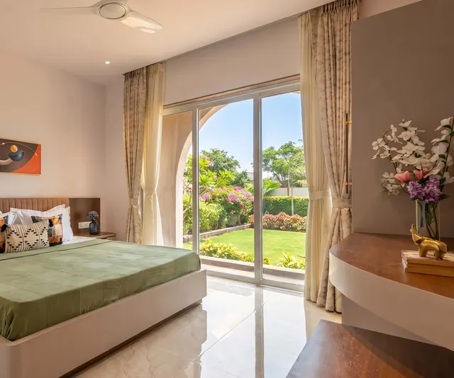 A bedroom opening onto the garden